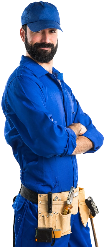 Man in blauwe werkkleding, met een pet en een gereedschapsriem, met zijn armen over elkaar, zelfverzekerd glimlachend voor een transparante achtergrond.